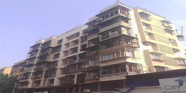 Semi Furnished 2 BHK Residential Apartment for Rent at Benzer Building, Andheri West.